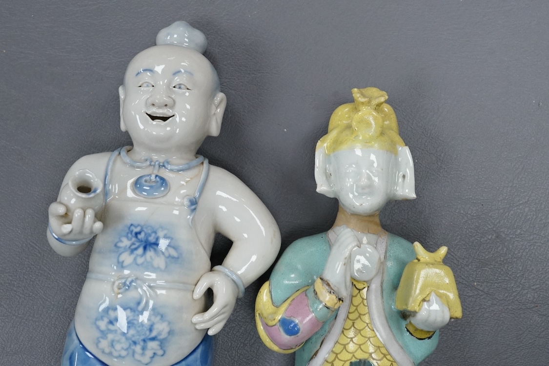 A Chinese enamelled porcelain figure of an immortal, Jiaqing period and a Japanese blue and white figure, tallest 20.5cm